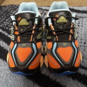 New Balance Kids' Black and Orange Sneakers